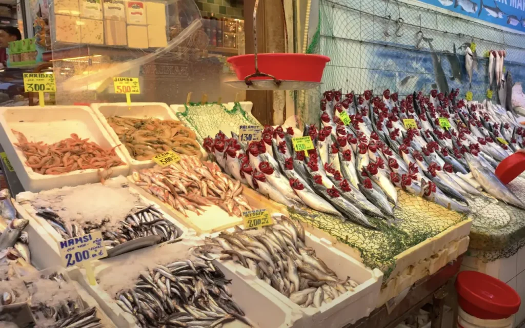 Fresh seafood displayed at a fish stall in Kadıköy Market.