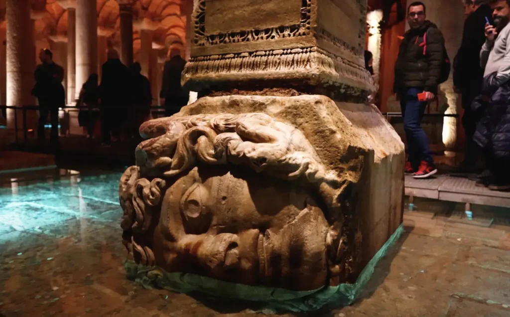 The famous Medusa head in the Basilica Cistern in Istanbul, showcasing its ancient and mysterious appeal.