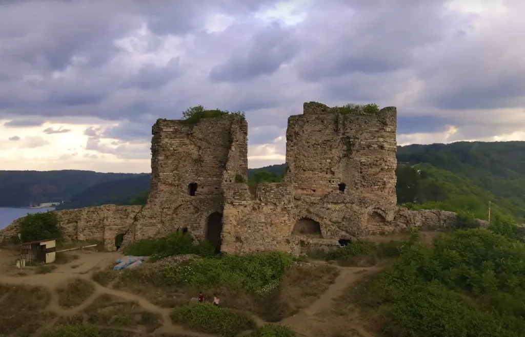 A drone view of Yoros Castle, perched high above the Bosphorus with sweeping views of the waterway.