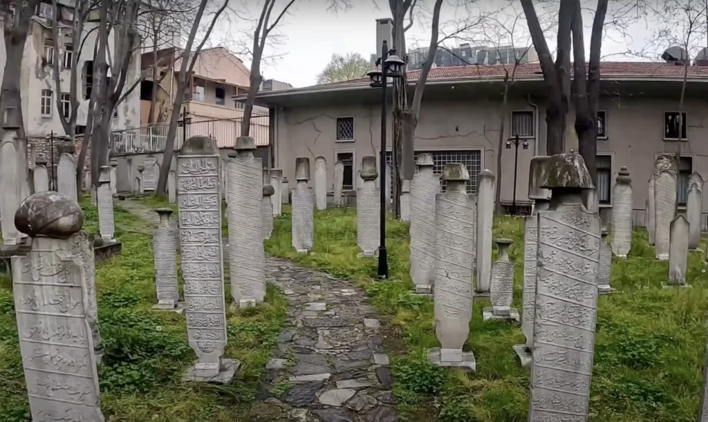 Cemetery at The Galata Mevlevi House Museum, featuring historic tombstones.