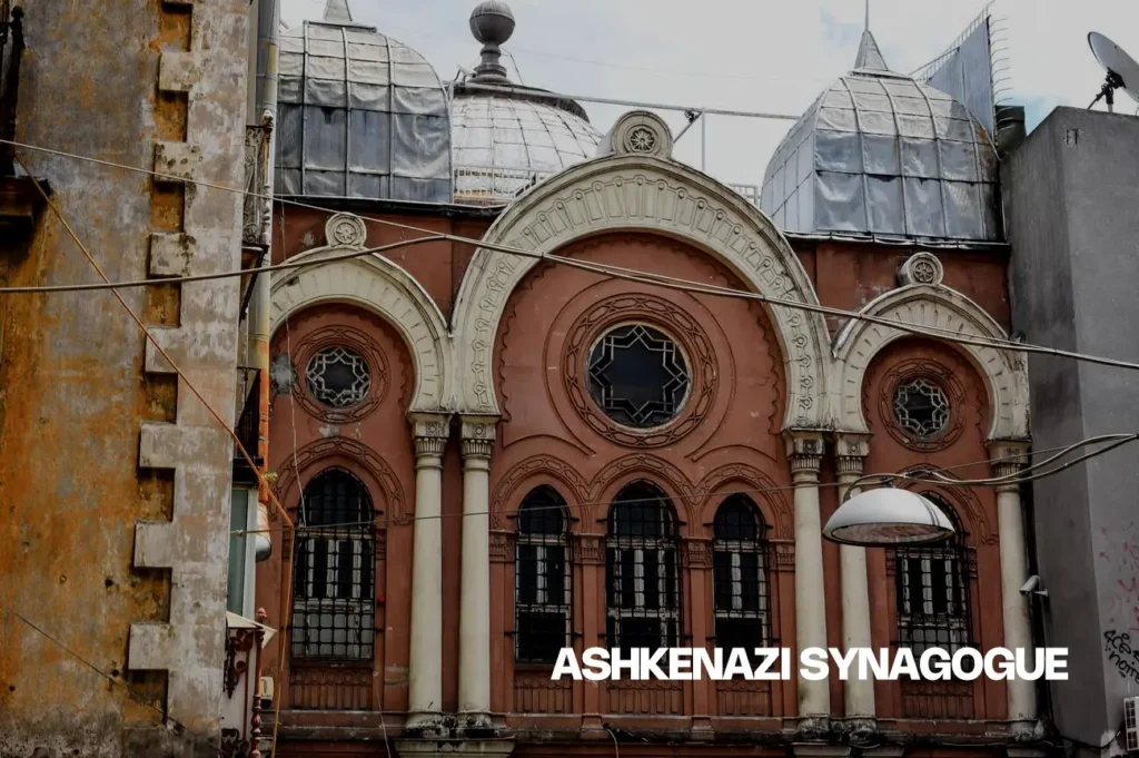 Exterior view of the Ashkenazi Synagogue in Istanbul, featuring ornate facade and architectural details.