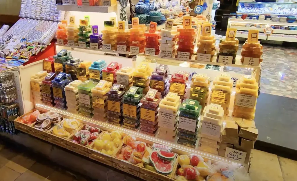 A variety of handmade soaps on display at Istanbul’s Spice Bazaar, featuring natural ingredients and vibrant colors.