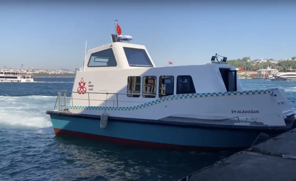 Sea taxi parked close to a pier in Istanbul.