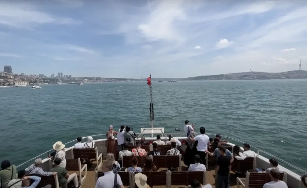 View of the Bosphorus from the open deck of a ferry in Istanbul.
