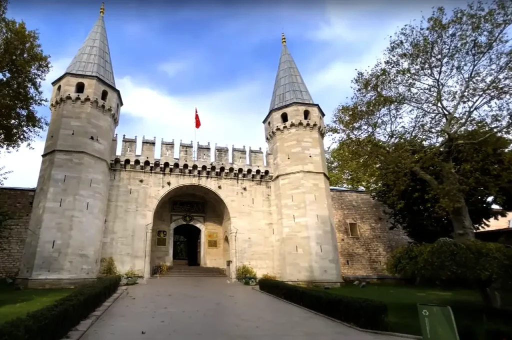 The grand main gates of Topkapi Palace, welcoming visitors to the historic Ottoman residence.