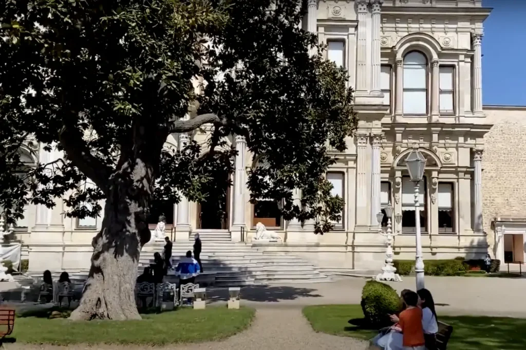 A view of Beylerbeyi Palace from its gardens, showcasing its elegant exterior.