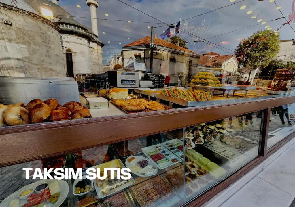 The display counter of Taksim Sütiş, filled with traditional Turkish breakfast items and pastries.