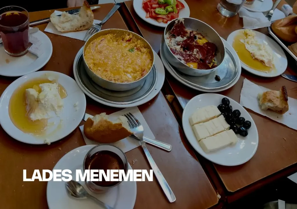 A Turkish breakfast featuring menemen, a traditional dish of scrambled eggs with tomatoes and peppers, at Lades in Istanbul.