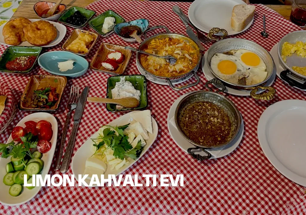 A hearty Turkish breakfast at Limon Kahvaltı Evi in Istanbul, with a variety of dishes including cheeses, jams, and eggs.