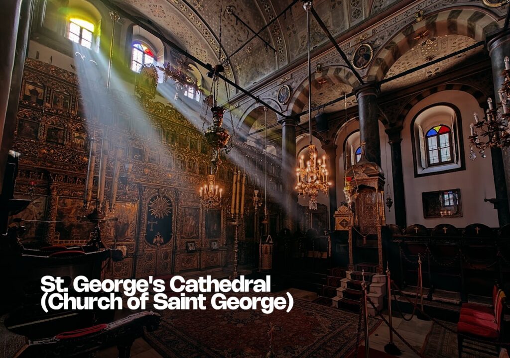 The ornate interior of St. George's Cathedral, with religious icons and chandeliers.