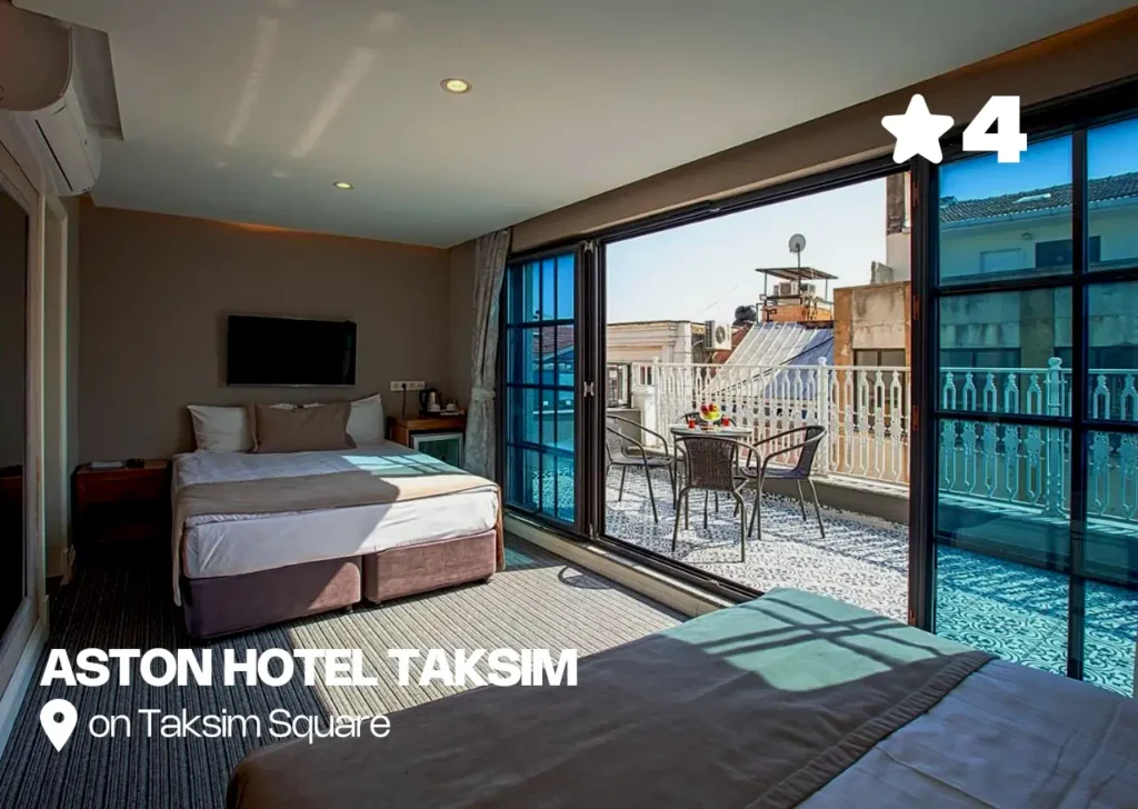 Aston Hotel Taksim room with panoramic windows and city views.