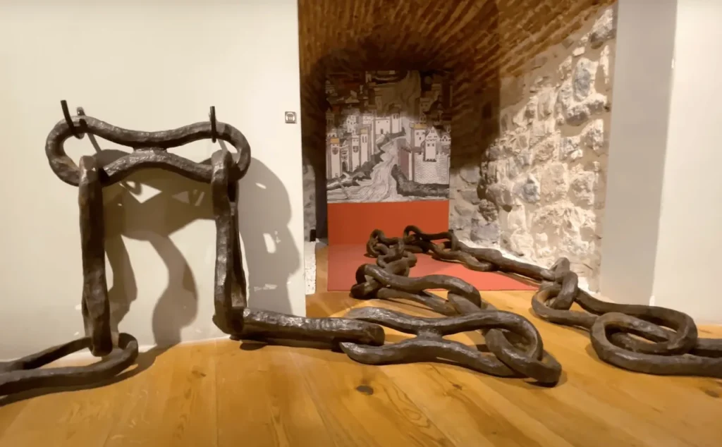 Exhibit of the Golden Horn chain at Galata Tower, showing the historic defense mechanism of the harbor.