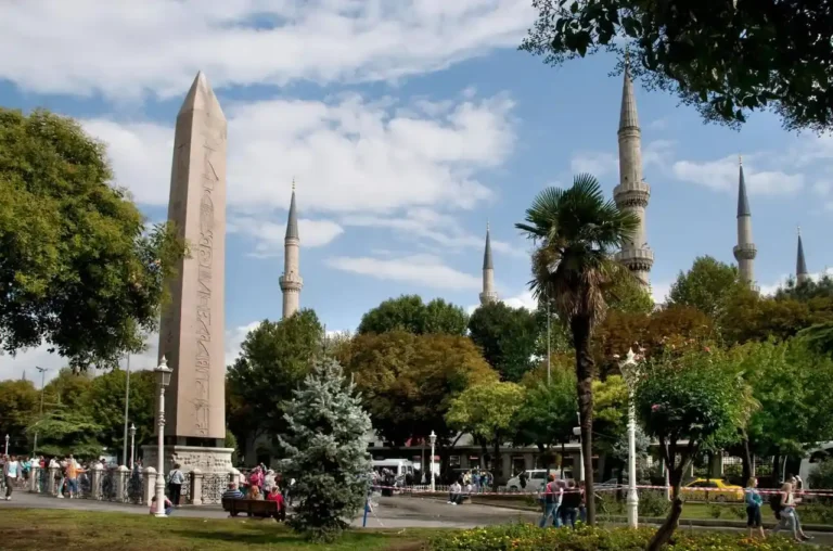 View of the Egyptian Obelisk at the Hippodrome in Sultanahmet, Istanbul, with surrounding historic structures.