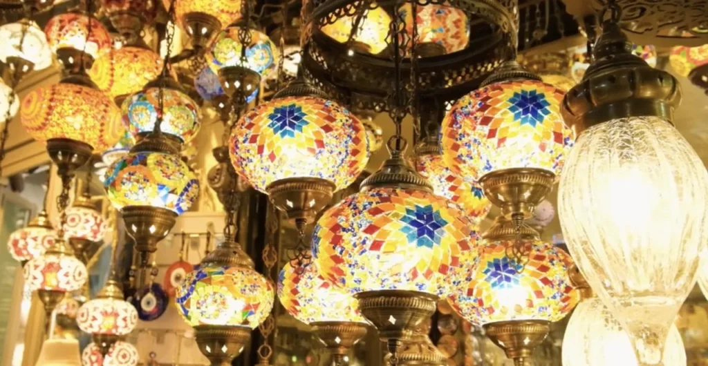 Lamp shop in the Grand Bazaar with hanging stained glass lanterns in vibrant colors.
